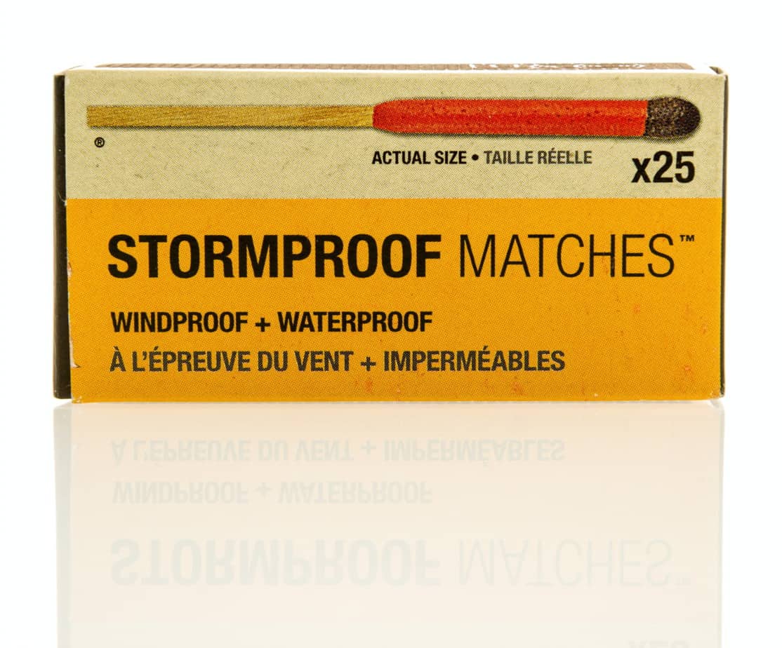 A yellow and white box of 25 windproof and waterproof stormproof matches, with an actual-size match printed on the label